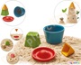 Ξύλινο σετ, με καλούπια άμμου από την Plan Toys, αποτελείται από 4 διαφορετικά πολύχρωμα σχήματα.