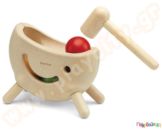 Ξύλινο παιχνίδι με σφυράκι και μπάλες, όπου το παιδί καλείται να χτυπήσει τις μπάλες με το σφυράκι.