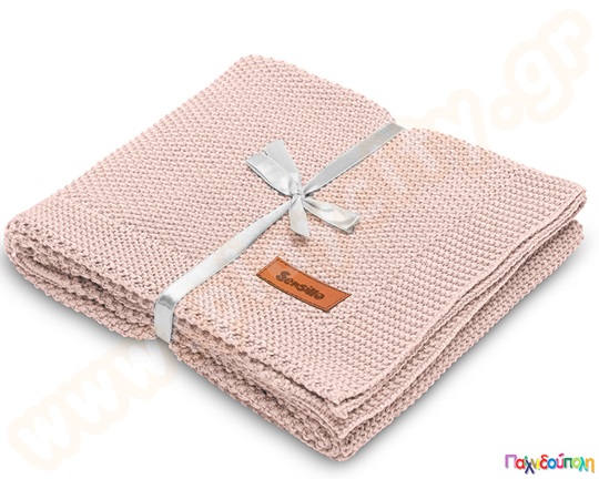 Λεπτή πλεκτή κουβέρτα σε ροζ χρώμα, φτιαγμένη από βαμβάκι, ιδανική για φθινόπωρο και άνοιξη.